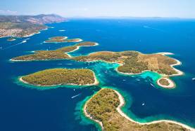 Islands in Agana, Croatia with lots of sail boats on the water