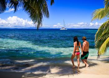 Couple walking on beach