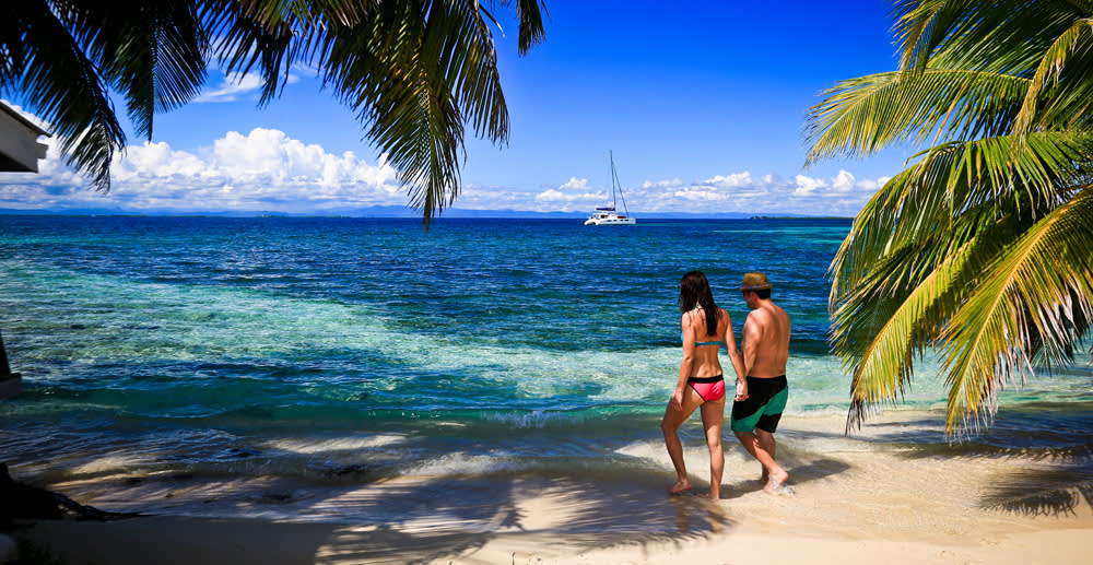 Couple walking on beach