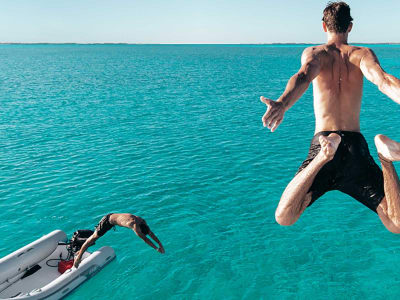 Jumping in water in the Exumas